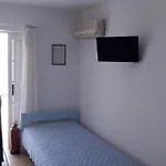 Quarto em Acomodações Particulares Thalassino Ageri *